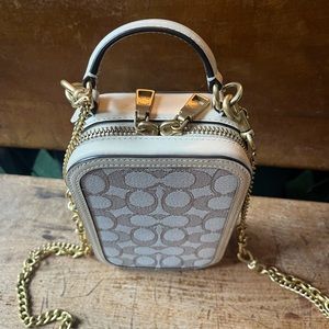 Coach Signature Jacquard Alie camera crossbody bag. Approx 4 1/4 L 6 3/4 H 2 W